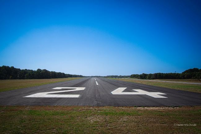 A photograph of runway 24 at Chatham Airport by Hunter MacDonald.